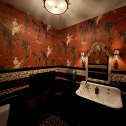 Armitage Alehouse - Colorful and classy unisex restroom decor.