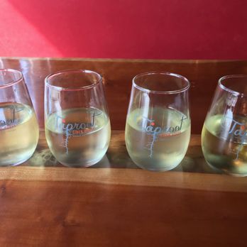 Taproot Cider House - My flight of ciders. Though it may not look it, they were varied and provided fascinatingly different flavors. - Bars Near Me - Traverse City, Michigan Taproot Cider House - My flight of ciders. Though it may not look it, they were varied and provided fascinatingly different flavors. - Bars Near Me - Traverse City, Michigan
