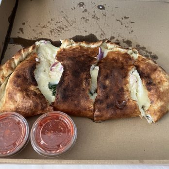 Flat Earth Pizza - CALZONE THE CHICKEN FLORENTINE - Pizza Near Me - Carson City, Nevada Flat Earth Pizza - CALZONE THE CHICKEN FLORENTINE - Pizza Near Me - Carson City, Nevada