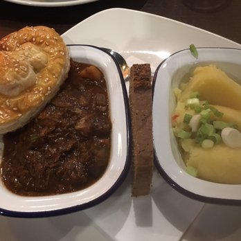The Hairy Lemon - Guinness beef stew, comes with potatoes and two pieces of bread - Irish Pub Near Me - Dublin, D The Hairy Lemon - Guinness beef stew, comes with potatoes and two pieces of bread - Irish Pub Near Me - Dublin, D