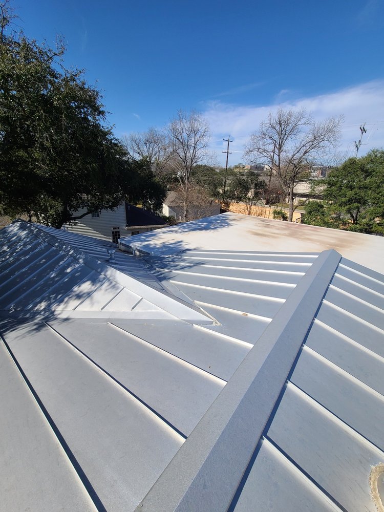 Slide of NSL Roofing Solutions