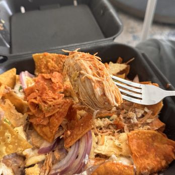Chilaquiles Modern Kitchen - Chilaquiles Divorciados with a chunk of chicken - Breakfast & Brunch Near Me - Maricopa, Arizona