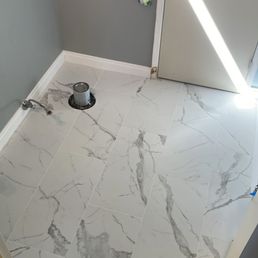 Tile floor after installation. Very well done and professional