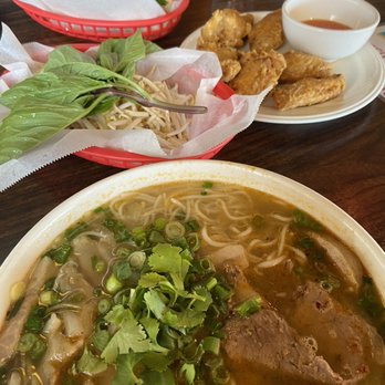 ViVi Pho Arapahoe - Bun Bo Hue (Spicy Vietnamese Pork and Beef Noodle Soup), Chicken Wings, and Banh Mi Thit Nuong (Vietnamese Grilled Pork Sandwich) - Vietnamese Near Me - Centennial, Colorado ViVi Pho Arapahoe - Bun Bo Hue (Spicy Vietnamese Pork and Beef Noodle Soup), Chicken Wings, and Banh Mi Thit Nuong (Vietnamese Grilled Pork Sandwich) - Vietnamese Near Me - Centennial, Colorado