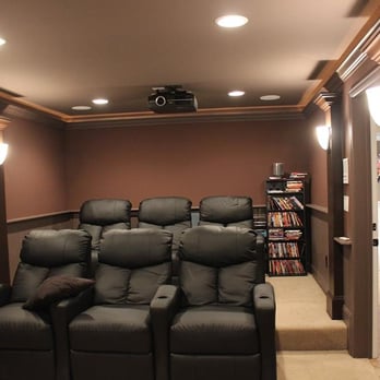 Morales Construction Group - a home theater with recliners - General Contractors Near Me Morales Construction Group - a home theater with recliners - General Contractors Near Me
