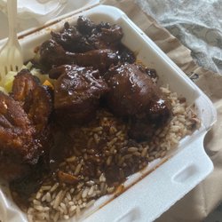 Tropical Krust - Brown stew chicken ,rice& peas,steamed cabbage and sweet plantain