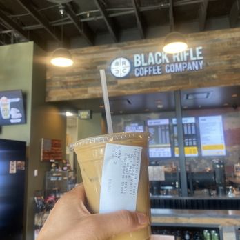 Black Rifle Coffee Company - Vanilla latte with an extra shot and oatmilk - Coffee & Tea Near Me - Spanish Fork, Utah Black Rifle Coffee Company - Vanilla latte with an extra shot and oatmilk - Coffee & Tea Near Me - Spanish Fork, Utah