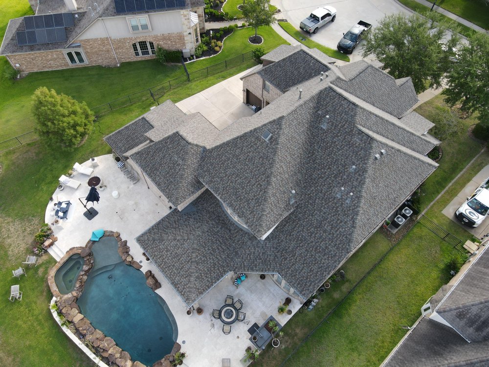 Slide of Core Four Roofing