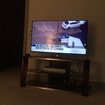 Empire AV Services & Installations - Before: 50 inch flat screen on regular tv stand. - Home Theatre Installation Near Me - Houston, Texas Empire AV Services & Installations - Before: 50 inch flat screen on regular tv stand. - Home Theatre Installation Near Me - Houston, Texas