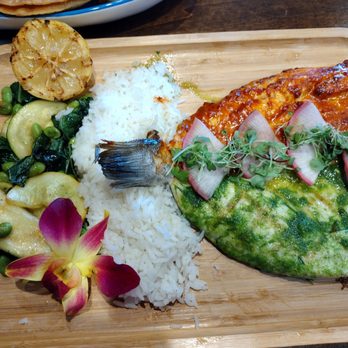 Captains Grill - Upland - Branzino Med. Sea Bass tasty green sauce and the other half a tasty Guajillo sauce. Not shown but with Cilantro rice was bomb! - Seafood Near Me - Upland, California