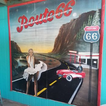 Route 66 Road Relics - our mural in front of our store route 66 road relics with a mural of Marilyn Monroe and James Dean on Route 66 - Antiques Near Me - Seligman, Arizona Route 66 Road Relics - our mural in front of our store route 66 road relics with a mural of Marilyn Monroe and James Dean on Route 66 - Antiques Near Me - Seligman, Arizona