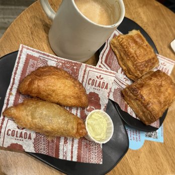 Colada Shop - GUAVA PASTELITO BREAKFAST EMPANADA PICADILLO (beef) EMPANADA LATTE - Cocktail Bars Near Me - Fairfax, Virginia