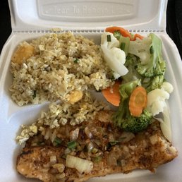 Grilled fish, sautéed vegetables and rice. Grilled fish, sautéed vegetables and rice.