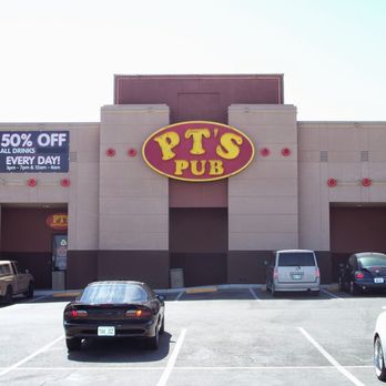 PT's Pub - a parking lot with parked cars - Sports Bars Near Me - Las Vegas, Nevada PT's Pub - a parking lot with parked cars - Sports Bars Near Me - Las Vegas, Nevada