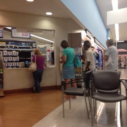 Walgreens - Long line of unhappy customers.