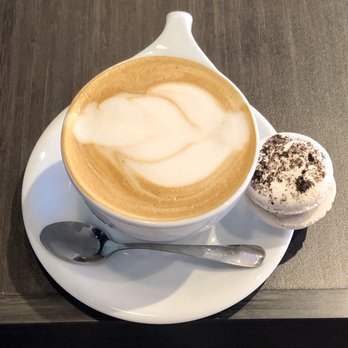 Well Coffee Co. - Latte with almond milk with a delicious macaroon...yummy! - Coffee & Tea Near Me - Peoria, Arizona