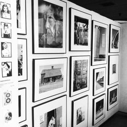 ABC Custom Framing - Black and photographs.
