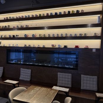 Sammy L Coffee - Seating and coffee cups for purchase. - Coffee & Tea Near Me - New York, New York