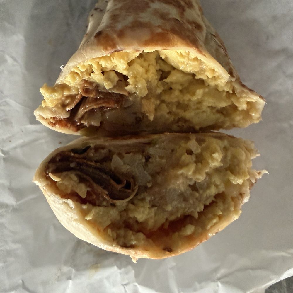 Breakfast burrito cut in half