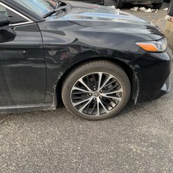Hertz Rent A Car - They give dirty scratched up cars.