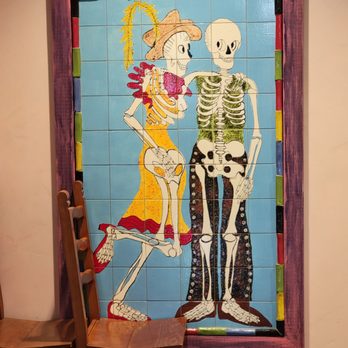 Dos Coyotes - a couple of skeletons standing in front of a tiled wall - Tex-Mex Near Me - Sacramento, California Dos Coyotes - a couple of skeletons standing in front of a tiled wall - Tex-Mex Near Me - Sacramento, California