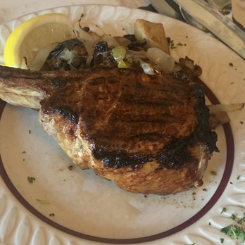 Caterina's - Bone in pork chop! Always so tender and juicy! - Italian Near Me - Milwaukee, Wisconsin