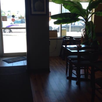 Potluck Restaurant - a view of a dining room - Caribbean Near Me - Mississauga, Ontario Potluck Restaurant - a view of a dining room - Caribbean Near Me - Mississauga, Ontario