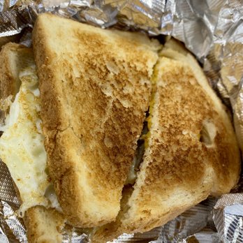 Dandee Donut Factory - 02.23.23 sausage, egg and cheese sandwich - Donuts Near Me - Pompano Beach, Florida