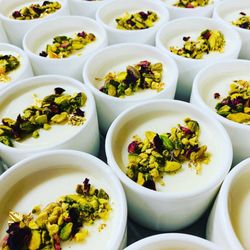 Cardamom & Sage - Mhalbia (rose water custard), crushed green pistachios, gold leaf