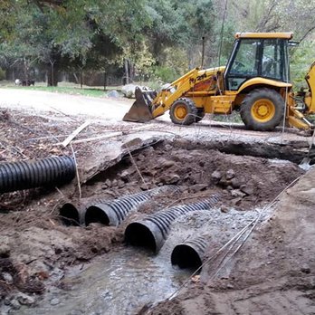 Aztec Excavation - This is an Arizona bridge repair in De Luz, CA. Old rusted out steel culvert pipe have been replaced with plastic pipe. - Excavation Services Near Me - Murrieta, California Aztec Excavation - This is an Arizona bridge repair in De Luz, CA. Old rusted out steel culvert pipe have been replaced with plastic pipe. - Excavation Services Near Me - Murrieta, California