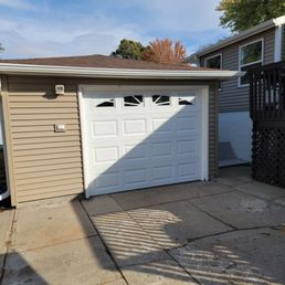 Exterior outside entrance of Lyft Pro Garage Door - 9x7 garage door with windows Exterior outside entrance of Lyft Pro Garage Door - 9x7 garage door with windows