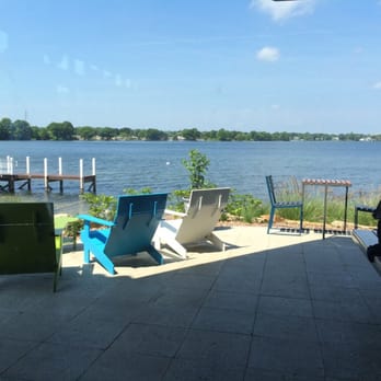 Shake Shack Winter Park - Nice view of the lake with a small patio and some adirondack chairs - Burgers Near Me - Winter Park, Florida