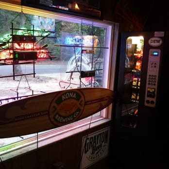 Wisteria Tavern - a surfboard in a window - Pubs Near Me - Pensacola, Florida Wisteria Tavern - a surfboard in a window - Pubs Near Me - Pensacola, Florida