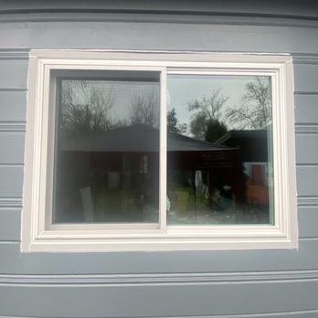 Marksman Exteriors - Bedroom window exterior - Windows Installation Near Me