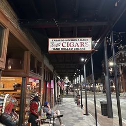 the outside of a cigar shop the outside of a cigar shop