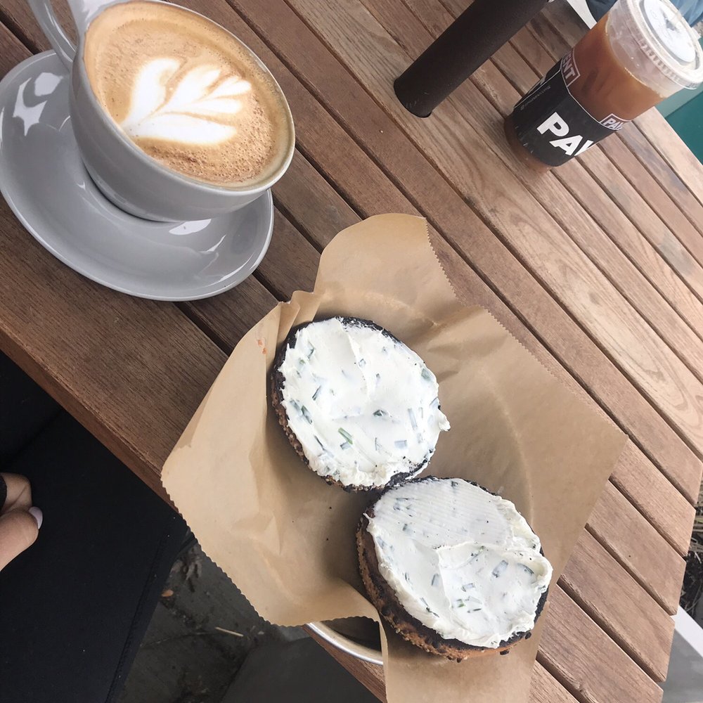 Pavement Coffeehouse - Everything bagel toasted twice with chive cream cheese and a vanilla latte. - Coffee & Tea Near Me - Brighton, Massachusetts Pavement Coffeehouse - Everything bagel toasted twice with chive cream cheese and a vanilla latte. - Coffee & Tea Near Me - Brighton, Massachusetts