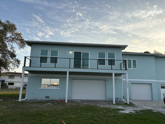 Palmetto residential project - A property in Palmetto damaged by hurricanes; to comply with FEMA requirements, it was necessary to demolish 65% of the structure and build a second level, which serves as the main living area (2,600 sq. ft.).