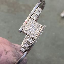 S & L Jewelers - A custom Bangle using the old stones from her previous wedding set.