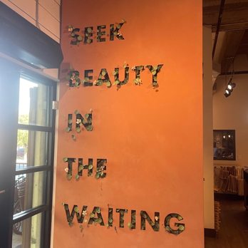 900° Pizzeria mobile - a sign that says feel beauty in the waiting - Food Trucks Near Me