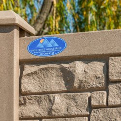 Vinyl Fence Wholesaler - Brown Granite Simulated Stone Fence by Vinyl Fence Wholesaler   507-206-4154