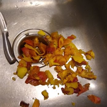 Burg's Corner - rotten parts cut from several peaches - Fruits & Veggies Near Me - Stonewall, Texas