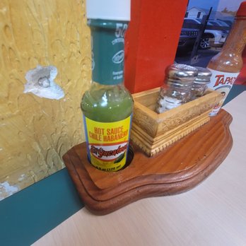 Sabor A Mexico - Bullet hole in wall - next to some really hot hot sauce - Mexican Near Me - Mineral, Virginia