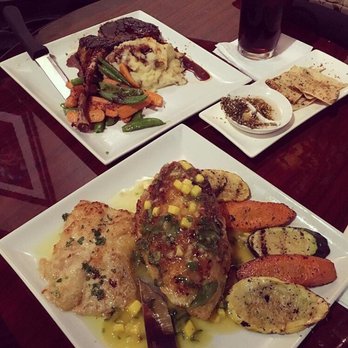 Mezza Grille - Mango Stuffed Chicken & Pork Chops in the back. - Mediterranean Near Me - Houston, Texas Mezza Grille - Mango Stuffed Chicken & Pork Chops in the back. - Mediterranean Near Me - Houston, Texas