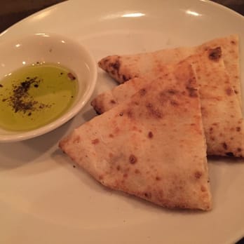 Mio Nonno - Hot Pita bread and olive oil is a nice change to the complimentary starter. - Italian Near Me - Allen, Texas Mio Nonno - Hot Pita bread and olive oil is a nice change to the complimentary starter. - Italian Near Me - Allen, Texas