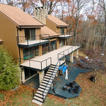 Quinlan Contracting - an aerial view of a home in the woods - General Contractors Near Me Quinlan Contracting - an aerial view of a home in the woods - General Contractors Near Me