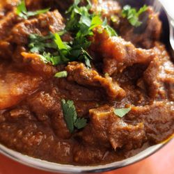 Baingan Indian Cuisine - Goat curry