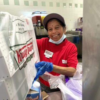 Krispy Kreme - a woman in a kitchen - Donuts Near Me - Wichita, Kansas