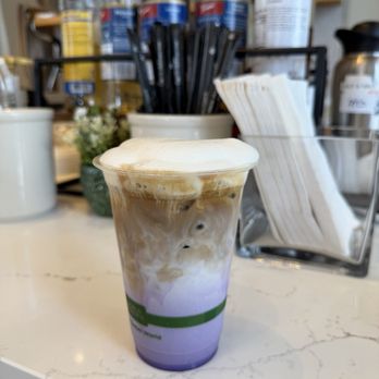 Common Ground - ube latte with laie vanilla foam - Coffee & Tea Near Me - Honolulu, Hawaii Common Ground - ube latte with laie vanilla foam - Coffee & Tea Near Me - Honolulu, Hawaii