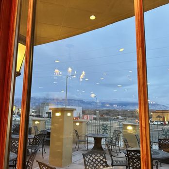 Los Cuates - a view of the city through a window - New Mexican Cuisine Near Me - Albuquerque, New Mexico