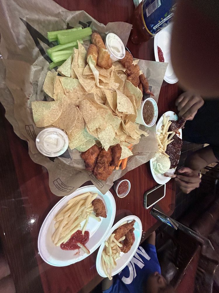 THE INTERNATIONAL OFFICE SPORTS BAR & GRILL Updated September 2024